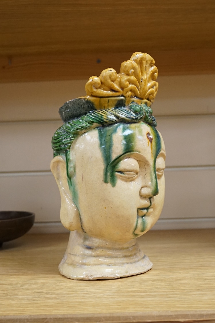A Chinese Sancai glazed bust of a Bodhisattva, 23cm high
